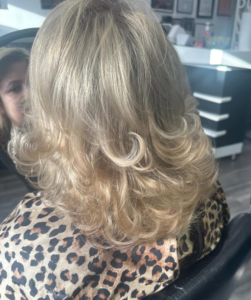 Satisfied clients enjoying professional hair services and beautiful results