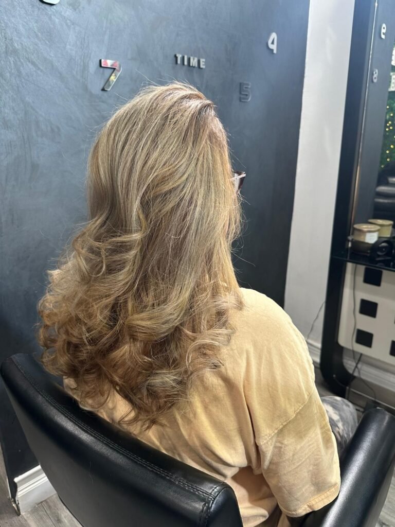 Satisfied clients enjoying professional hair services and beautiful results